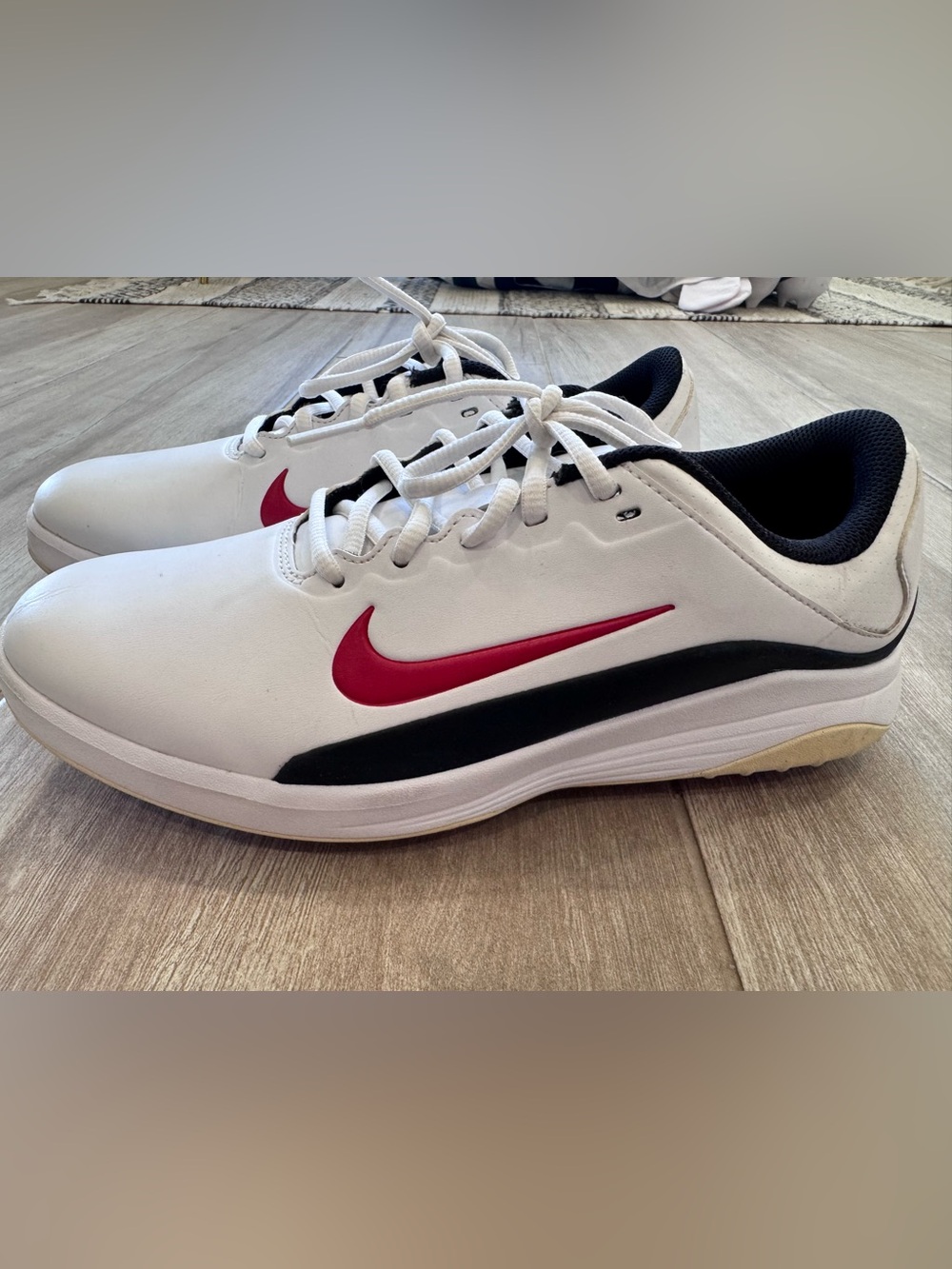 Nike Men’s White Golf Shoes with Red Swoosh and Black Accents
